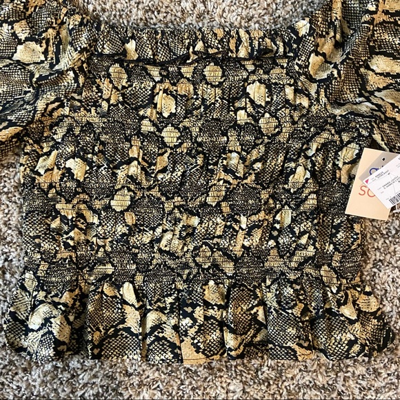 Snake skin pattern off the shoulder ruffle top. - Picture 2 of 5